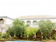 Satılır 10 otaqlı 450 m2 həyət evi Novxanı