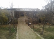 Satılır 4 otaqlı 2400 m2 həyət evi Türkan