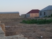 Satılır 7 sot torpaq Binə ticarət mərkəzi