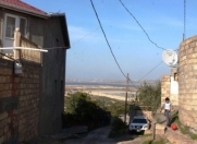 Satılır 12 otaqlı 210 m2 həyət evi 7 mkr