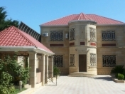 Satılır 8 otaqlı 600 m2 həyət evi Novxanı