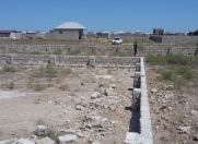 Satılır 20 sot torpaq Binə ticarət mərkəzi