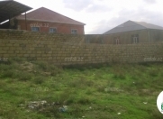 Satılır 4 sot torpaq Binə ticarət mərkəzi