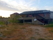 Satılır 4 otaqlı 1200 m2 həyət evi Buzovna