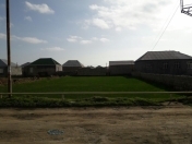 Satılır 8 sot torpaq Binə ticarət mərkəzi