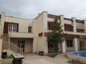 Satılır 6 otaqlı 490 m2 bağ evi Novxanı