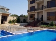 Satılır 10 otaqlı 450 m2 villa Novxanı