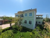 Satılır 8 otaqlı 500 m2 villa Novxanı