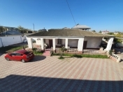 Satılır 6 otaqlı 3000 m2 bağ evi Novxanı