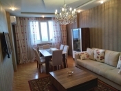 Satılır 3 otaqlı 130 m2 yeni tikili Heydər Əliyev Mərkəzi