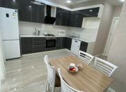 İcarəyə verilir 3 otaqlı 100 m2 yeni tikili 20 yanvar m.