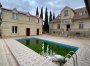 Satılır 10 otaqlı 600 m2 villa Novxanı