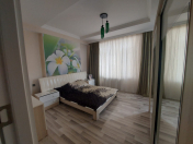 Satılır 4 otaqlı 136 m2 yeni tikili 8 km