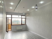 Satılır 2 otaqlı 98 m2 yeni tikili Bakı Dövlət Universiteti