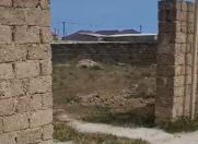 Satılır 0.7 sot torpaq Binə