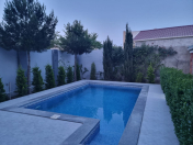 İcarəyə verilir 2 otaqlı 100 m2 bağ evi Novxanı
