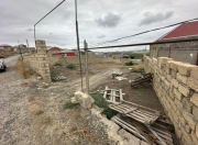 Satılır 7 sot torpaq Fairmont otel