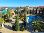 Satılır 14 otaqlı 600 m2 villa Novxanı