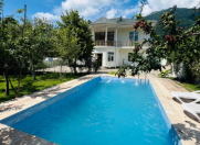 İcarəyə verilir 4 otaqlı 100 m2 həyət evi Qax