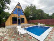 İcarəyə verilir 2 otaqlı 92 m2 bağ evi Qəbələ