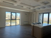 Satılır 4 otaqlı 126.7 m2 yeni tikili Ağ şəhər