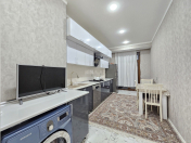 Satılır 3 otaqlı 108 m2 yeni tikili Xırdalan